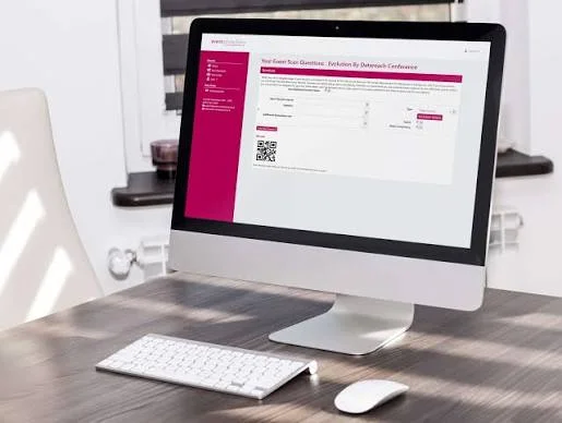 Exhibitor Lead Retrieval UAE 2 Desktop monitor showing a question setup page with a QR code